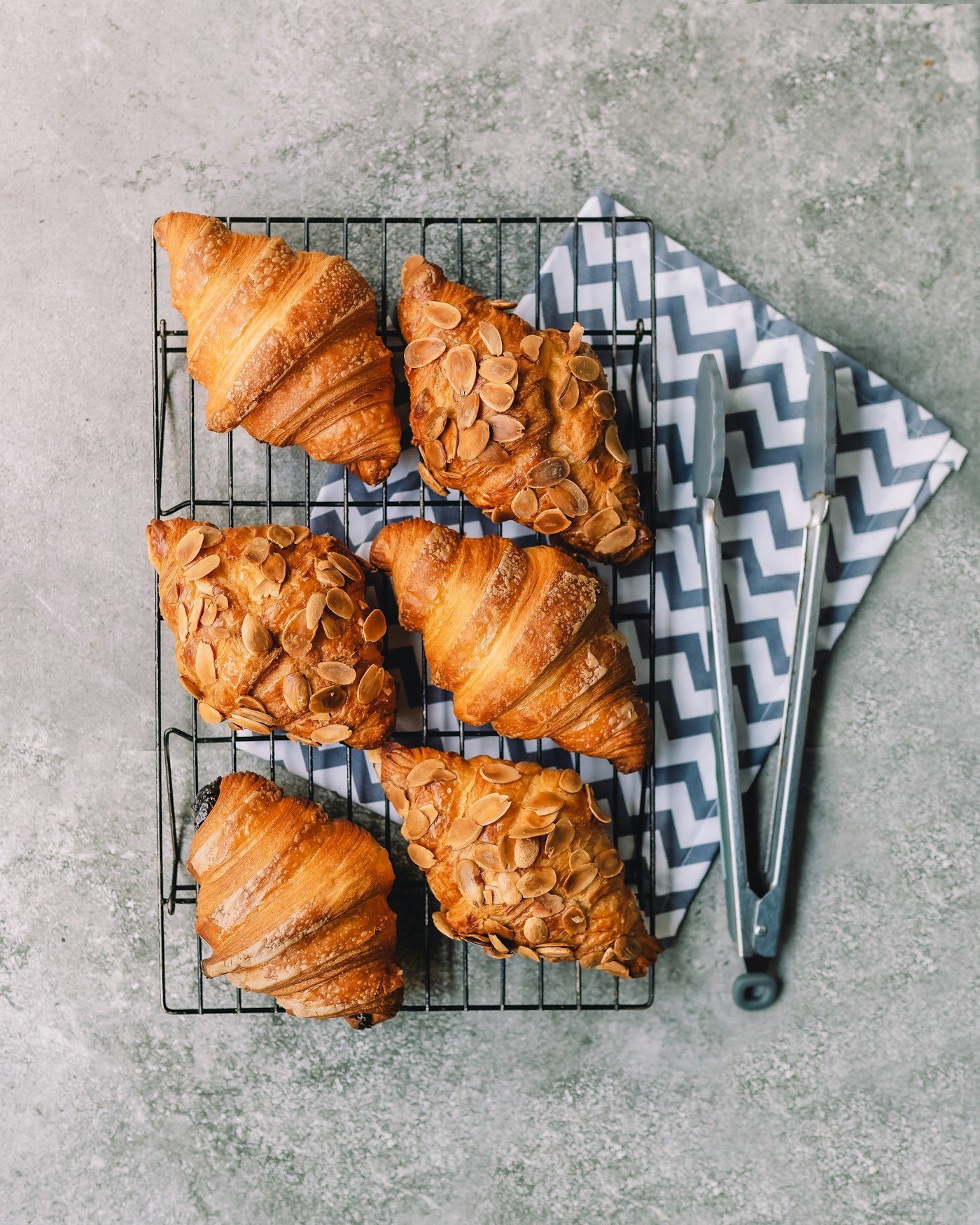 Almond croissants dusted with powdered sugar