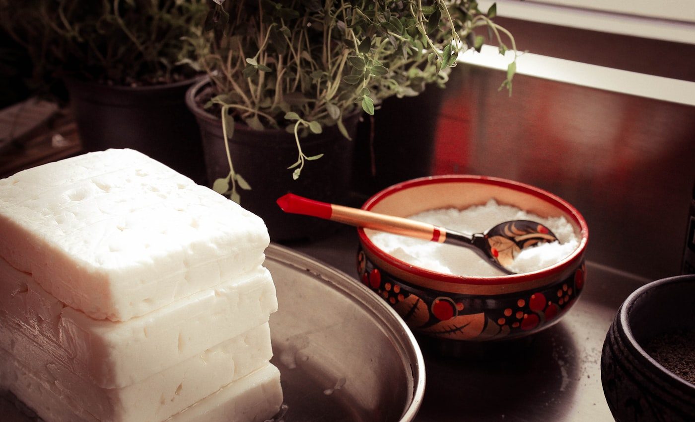 Block of feta cheese with herbs