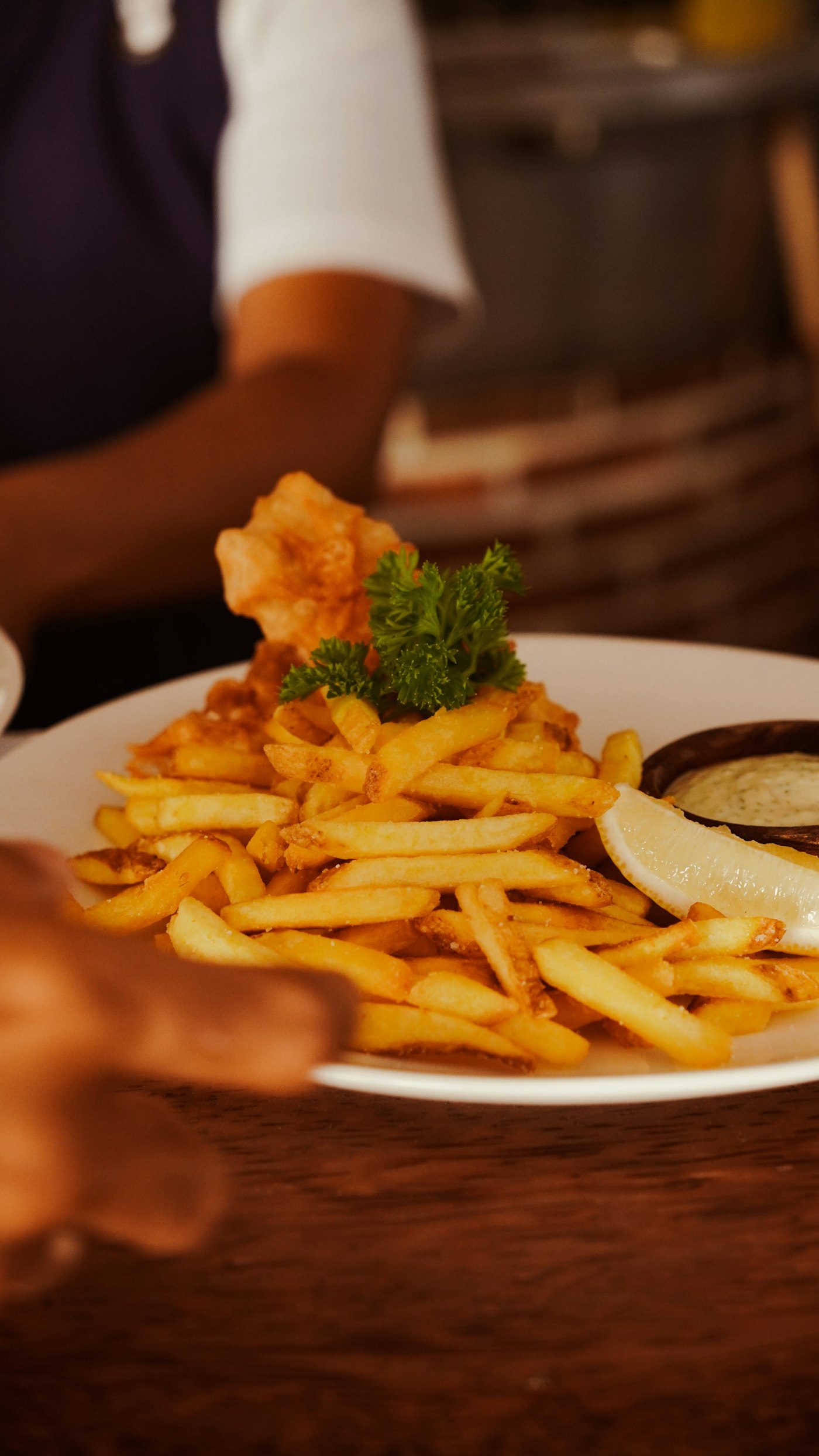Fish and chips with lemon and tartar sauce