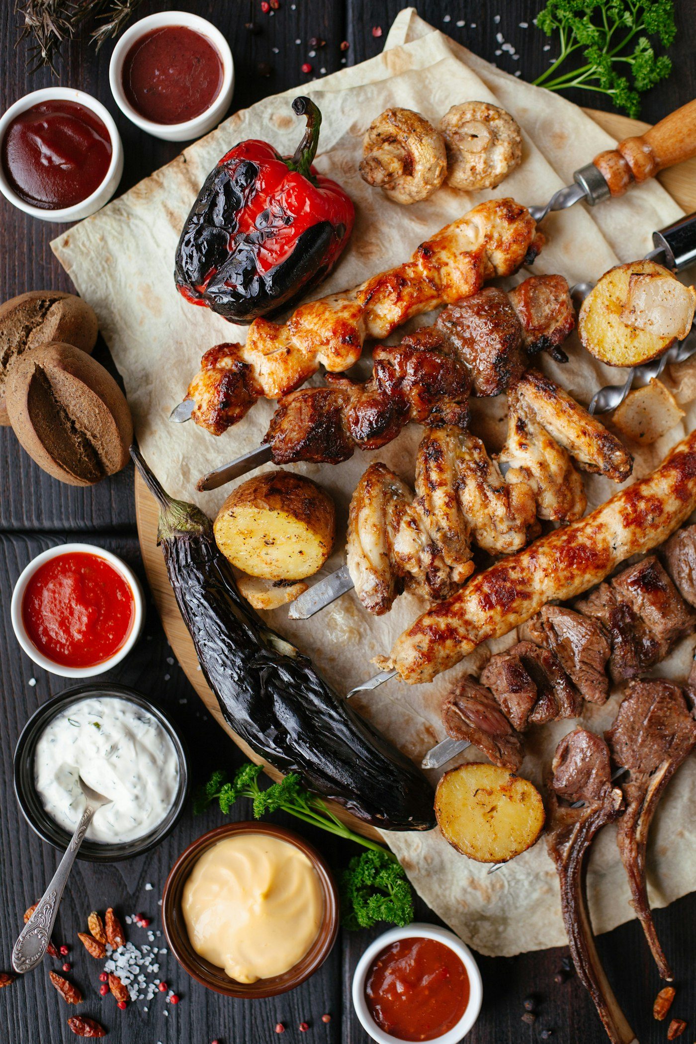 Mixed grill platter with kebabs and vegetables