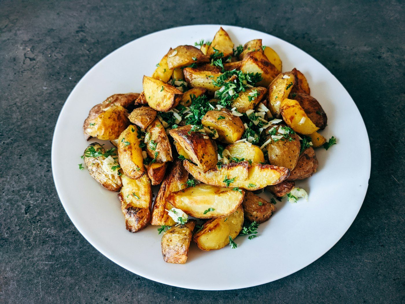 Spicy fried potatoes batata harra style