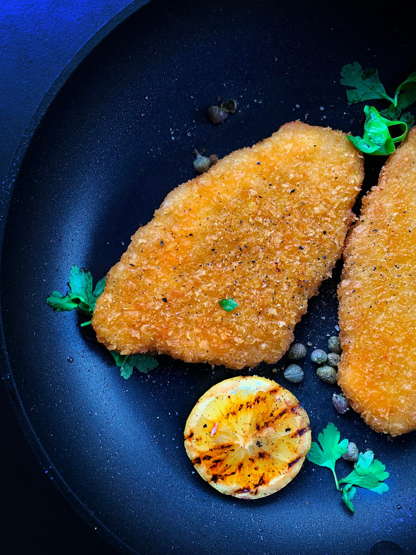 Chicken escalope with cheese and tomato